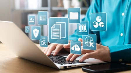 A person at work using the AI document classification engine from SmartPrint to sort their files automatically.