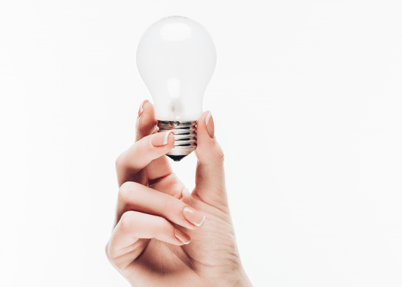 holding a lightbulb to think about consolidating office print vendors